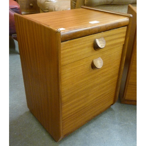 51 - A pair of teak bedside cabinets