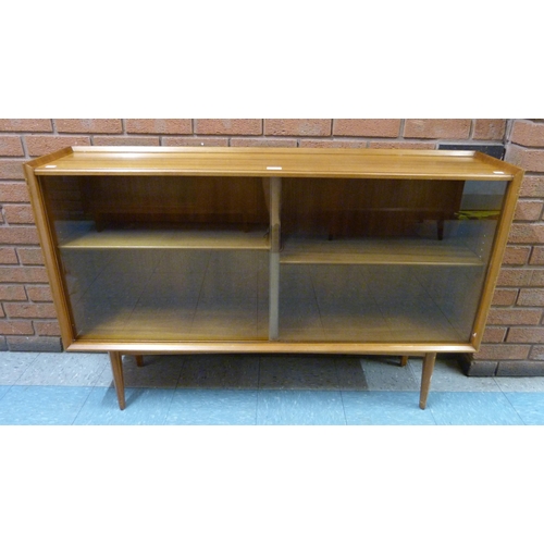 6 - A teak bookcase