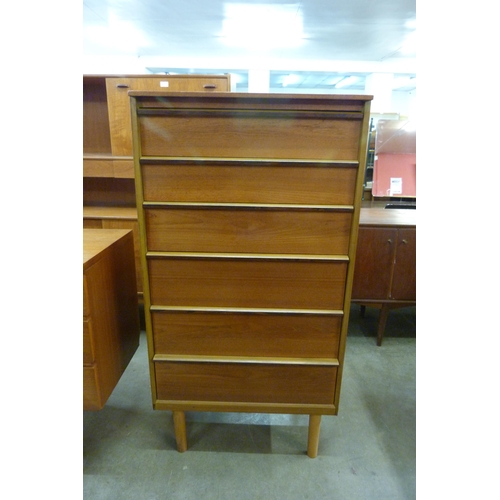 63 - An Austin Suite teak chest of drawers