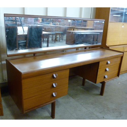 74 - A White & Newton teak dressing table