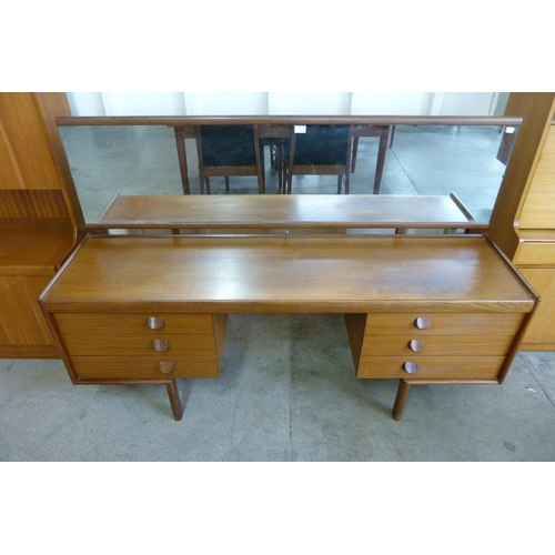 74 - A White & Newton teak dressing table