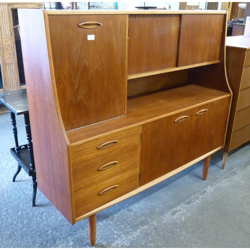 76 - A Jentique teak highboard