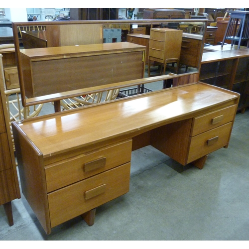 80 - A White & Newton teak dressing table