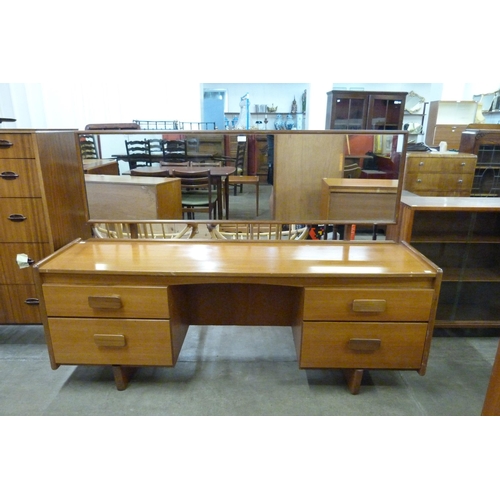 80 - A White & Newton teak dressing table