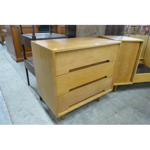 84 - A Stag C-Range oak chest of drawers and dressing table, designed by John and Sylvia Reid