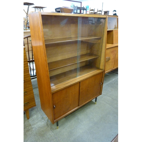 87 - A teak bookcase