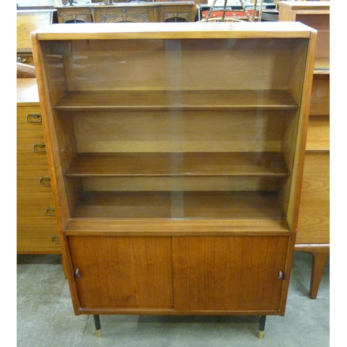 87 - A teak bookcase