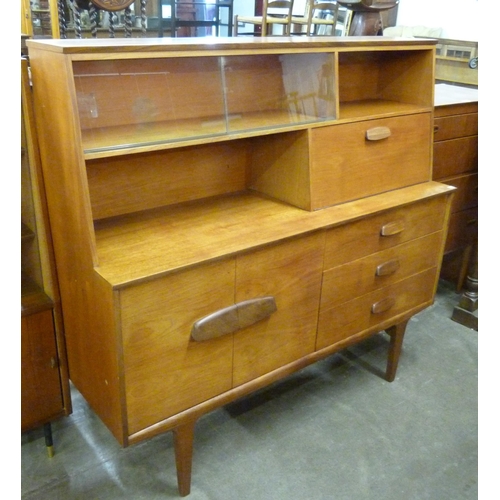 88 - A teak highboard