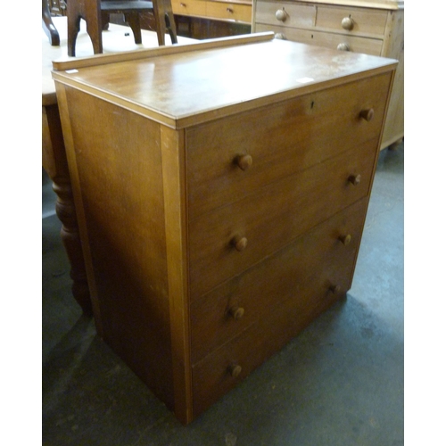 92 - An oak and walnut chest of drawers