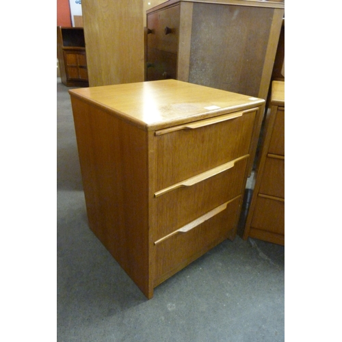 95 - A pair of teak bedside chests