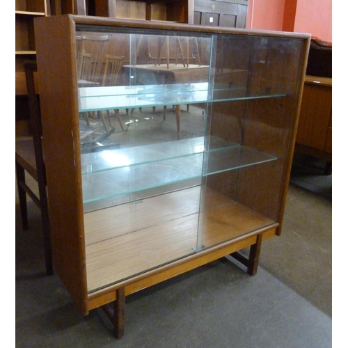 97 - A Turnidge of London teak bookcase