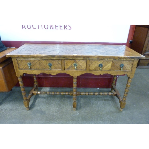 98 - A Queen Anne style oak parquetry top three drawer dresser