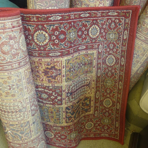 1662 - A set of six matching rugs, all used