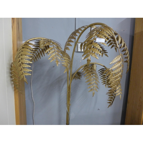 1393 - A gold floor standing palm lamp