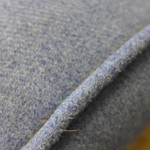 1631 - A large four seater blue upholstered sofa