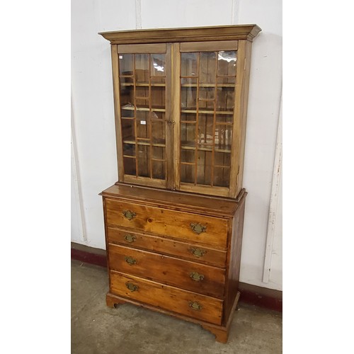 33 - A George III style pine and beech secretaire estate cupboard