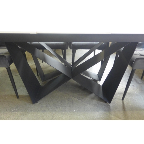 1457 - A marble effect extending dining table with a set of six Kos graphite velvet pinched back dining cha... 