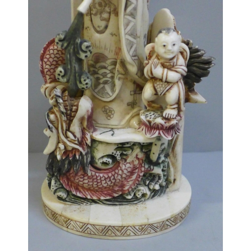 602 - A hand painted Kwan-Yin Mercy Buddha Dragon and Guardian Boy figure, 28cm