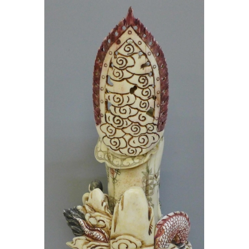 602 - A hand painted Kwan-Yin Mercy Buddha Dragon and Guardian Boy figure, 28cm