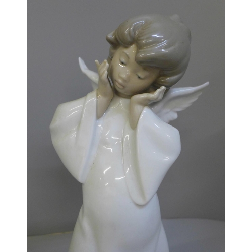 604 - Three Lladro figures, two boxed:- Mime Angel, How Skillful and Clown