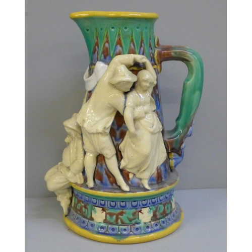 605 - A Minton style Majolica Taverner pitcher, tapered form, with several unruly tavern figures, a/f, 25c... 