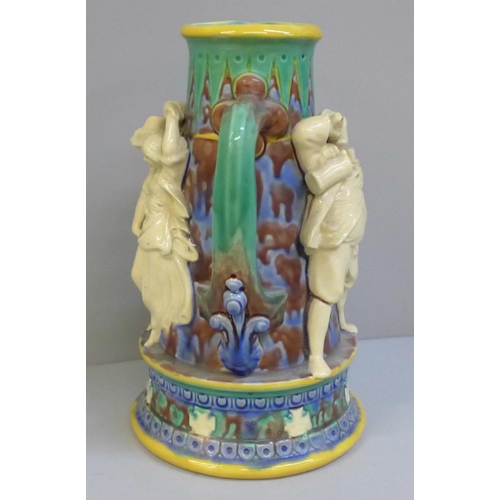 605 - A Minton style Majolica Taverner pitcher, tapered form, with several unruly tavern figures, a/f, 25c... 