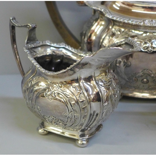 606 - A three piece silver plated tea service