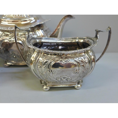 606 - A three piece silver plated tea service