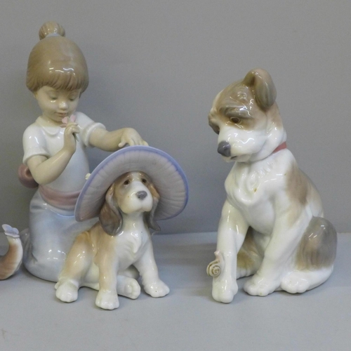 607 - Three Lladro figures, boxed:- Gentle Surprise, An Elegant Touch and New Friend