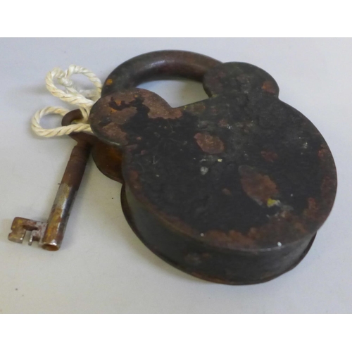 618 - A vintage padlock with key