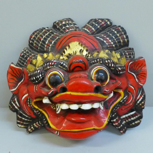 643 - A Balinese traditional wall mask, 20cm