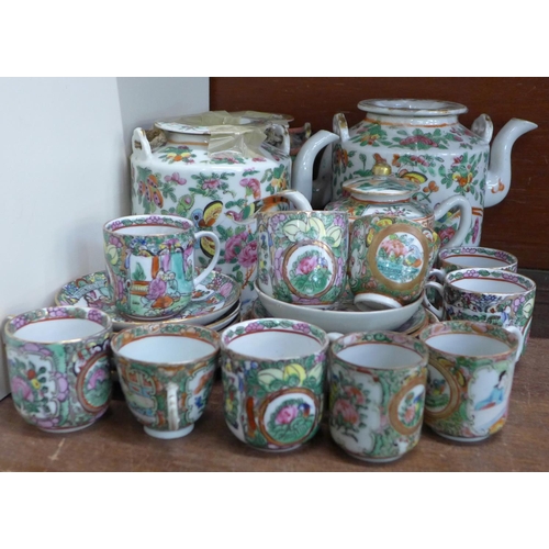 655 - Chinese export famille rose teawares including four teapots