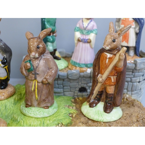 663 - A Royal Doulton Bunnykins Robin Hood collection and base, all boxed