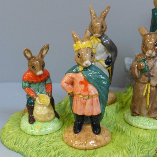 663 - A Royal Doulton Bunnykins Robin Hood collection and base, all boxed