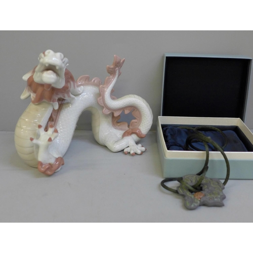 683 - A Lladro dragon and a Lladro Talisman necklace, boxed