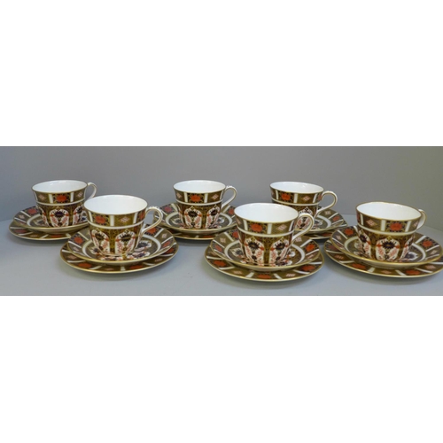 695 - Six Royal Crown Derby 1128 Imari trios, first quality