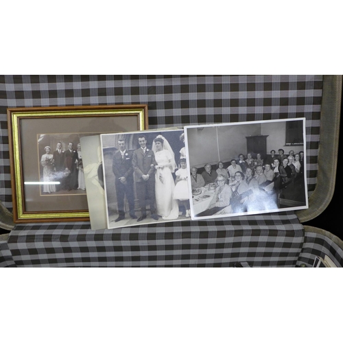 710 - A suitcase of old photographs including two albums of 1950s shipping photographs