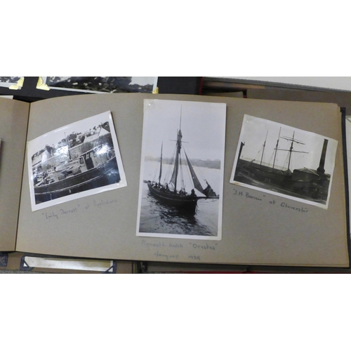 710 - A suitcase of old photographs including two albums of 1950s shipping photographs