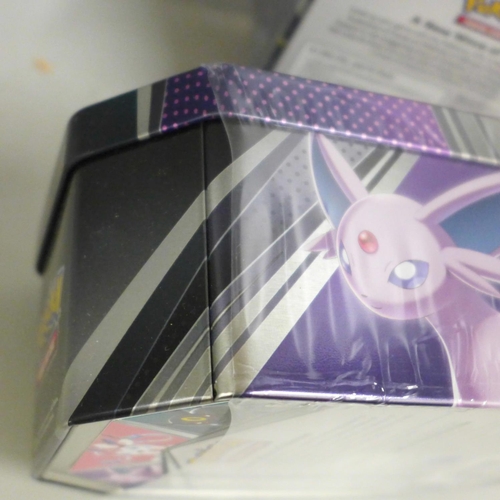 711 - Three sealed Pokemon tins, TCG 2022 collector's tin, A New Wave of Heroes