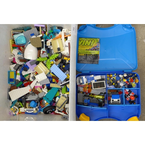 713 - A large quantity of Lego including a mini figure and a Lego case