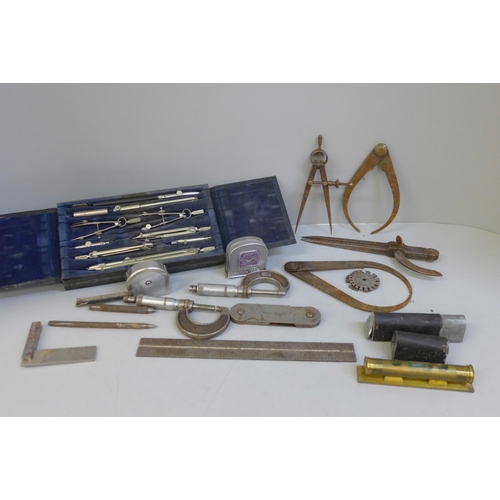 729 - Two Moore & Wright micrometers, drawing tools, two tape measures, etc.