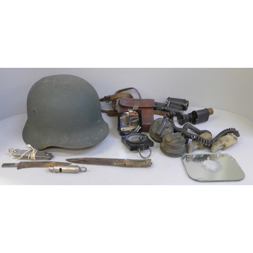 733 - Military items with helmet, monoculars, compass, etc.