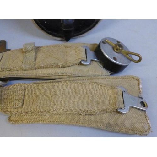 734 - A WWII aircraft seat harness and a railways line token holder