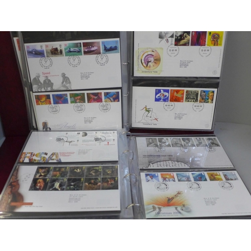 744 - Stamps; two Royal Mail First Day Covers albums containing covers spanning the period 1994 to 2005