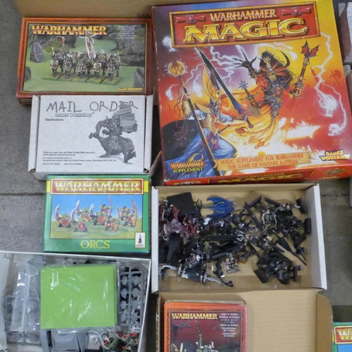 756 - A large collection of Warhammer figures in associated boxes and a polystyrene castle