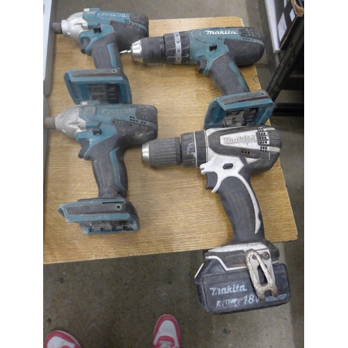 2061 - A Makita drill (model no. HP4570), Makita drill (PHP-456), 2 Makita impact drivers (TD1270) and a Ha... 