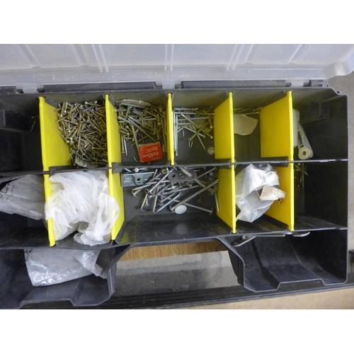 2071 - A Stanley tool box with a quantity of screws and nails