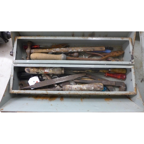 2072 - A metal tool box with screwdrivers, spanners and other tools