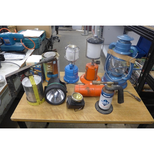 2095 - Four Tilley lamps and a quantity of camping equipment including an S200 camping gaz stove, blow torc... 