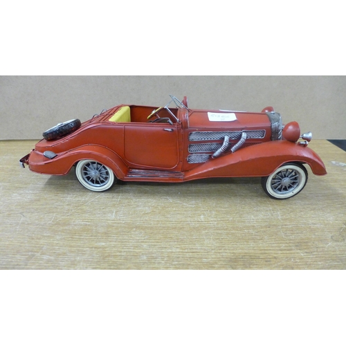 2158 - A tin plate vintage red car